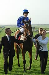 Pride and Christophe Lemaire parading in front of the stands following their impressive victory in the Champion Stakes