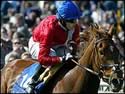 Kieren Fallon and Russian Rhythm took the 2003 1,000 Guineas 